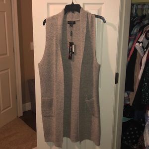 Charlie Paige S/M cardigan with tags.